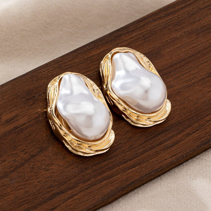 Retro shaped imitation pearl earrings